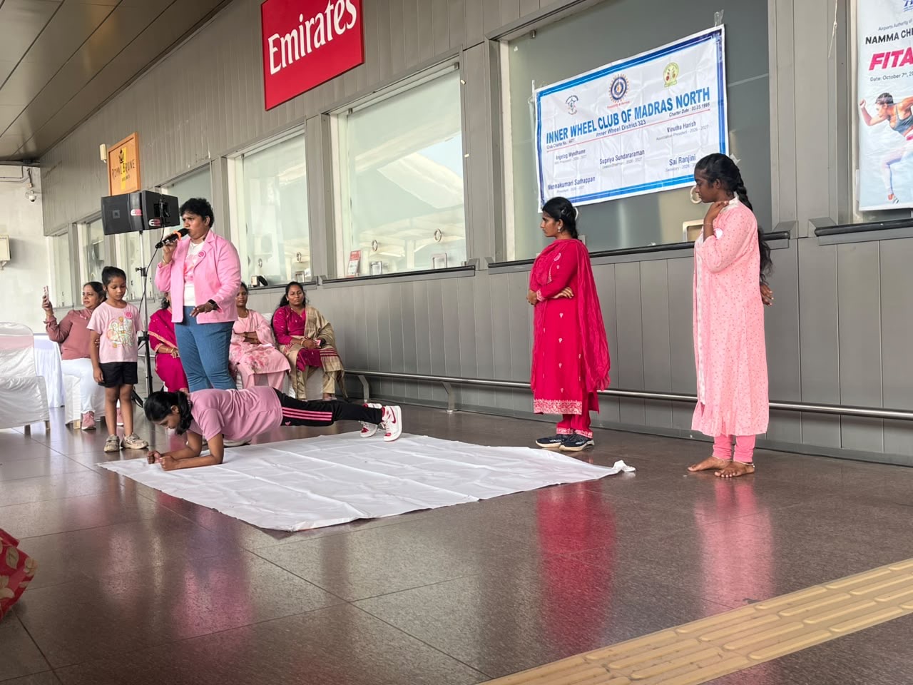 A plank demonstration guided from the microphone.